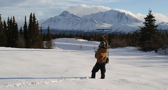 Ecologist Michael Peers snowshoe hair telemetry