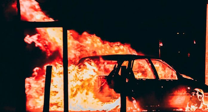 Burning car at racism protest