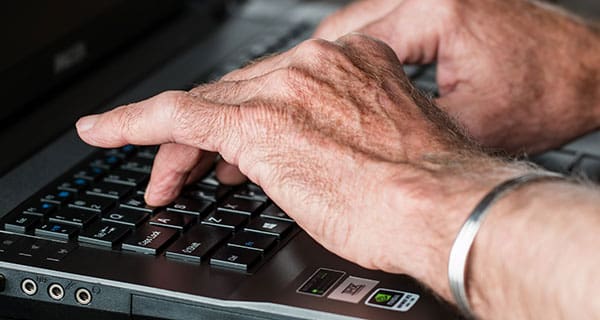 Typing on a laptop Email follow-up hints for after the job interview