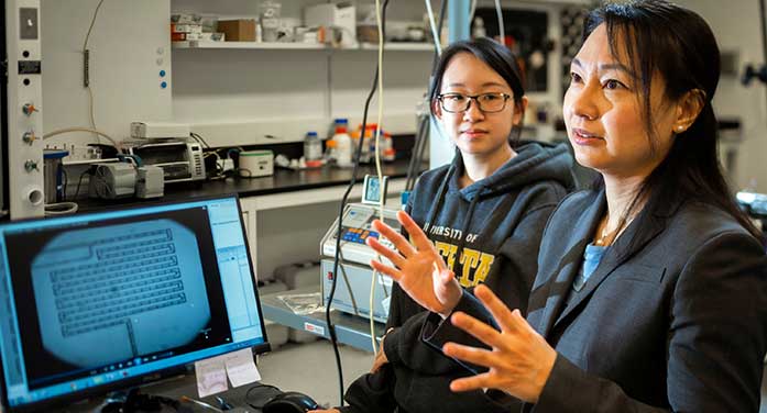 Engineering professor Amy Tsai graduate student Junyi Yang