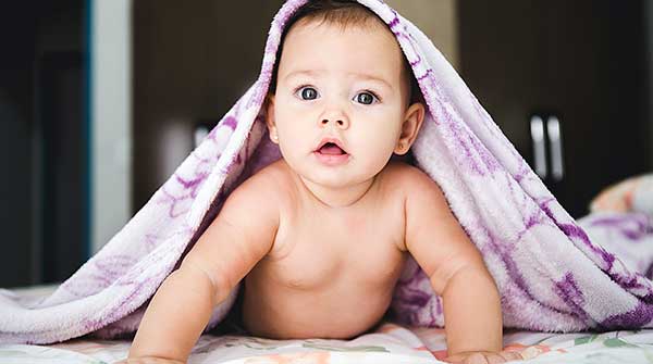 Tummy time, reading among recommended activities that boost babies' motor  development
